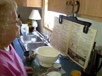 cook and look to the book with no hands